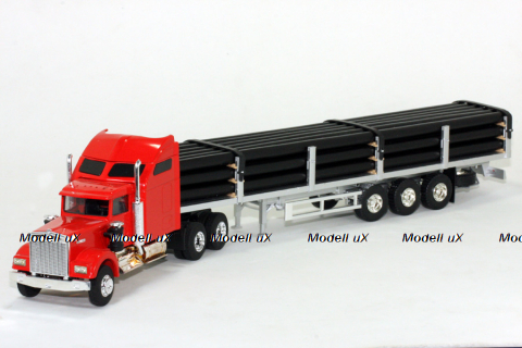 Kenworth W900 Aerocab with Flatbed Trailer and Pipe Load 