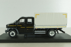 Газон NEXT C42R31 бортовой с тентом черный/серый Н231, Наш Автопром 1:43