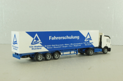 Mercedes SK 1850 LS tractor with semi-trailer "Fahrerschulung" 1994, blue/white, Herpa 1:87