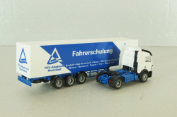 Mercedes SK 1850 LS tractor with semi-trailer "Fahrerschulung" 1994, blue/white, Herpa 1:87