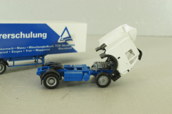 Mercedes SK 1850 LS tractor with semi-trailer "Fahrerschulung" 1994, blue/white, Herpa 1:87