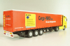 Mercedes-Benz Actros 1846 tractor with semi trailer "Cargo-Maxx" yellow/red, 555, NZG 1:50
