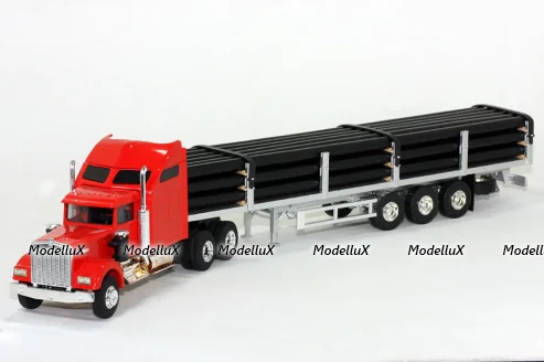 Kenworth W900 Aerocab with Flatbed Trailer and Pipe Load 