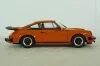 Porsche 911 Carrera 3.2 1984 orange, 1802609, Solido 1:18