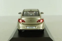 Opel Astra 2012 gold metallic, 07751000-10005, Minichamps 1:43  Уценка!