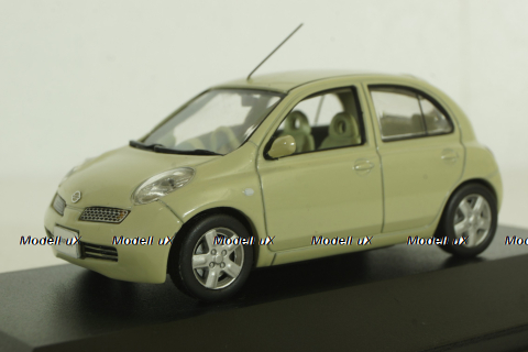 Nissan Micra/March (K12) 2002, yellow, JC030Y, J-Collection 1:43