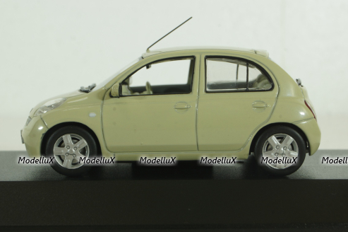 Nissan Micra/March (K12) 2002, yellow, JC030Y, J-Collection 1:43
