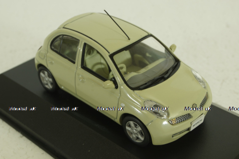 Nissan Micra/March (K12) 2002, yellow, JC030Y, J-Collection 1:43