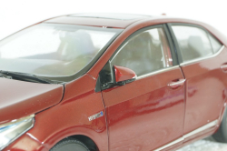 Toyota Corolla Hybrid E180, 2016 red Paudi 1:18