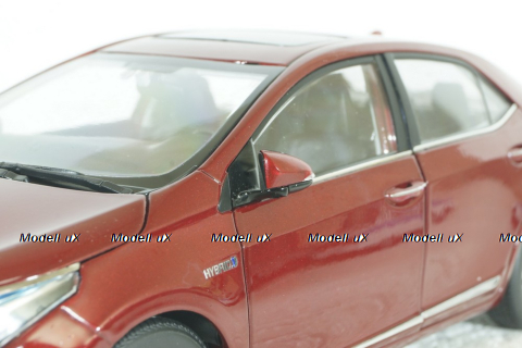 Toyota Corolla Hybrid E180, 2016 red Paudi 1:18