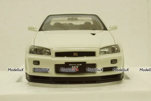 Nissan Skyline GT-R (R34) V-Spec II, white pearl, 77406,AutoArt 1:18 Уценка