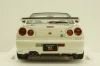 Nissan Skyline GT-R (R34) V-Spec II, white pearl, 77406,AutoArt 1:18 Уценка