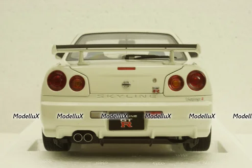 Nissan Skyline GT-R (R34) V-Spec II, white pearl, 77406,AutoArt 1:18 Уценка