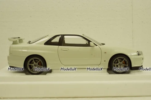 Nissan Skyline GT-R (R34) V-Spec II, white pearl, 77406,AutoArt 1:18 Уценка
