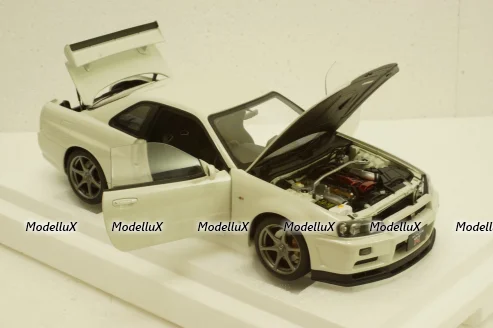 Nissan Skyline GT-R (R34) V-Spec II, white pearl, 77406,AutoArt 1:18 Уценка