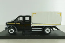 Газон NEXT C42R31 бортовой с тентом черный/серый Н231, Наш Автопром 1:43