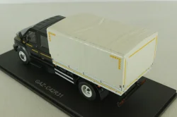 Газон NEXT C42R31 бортовой с тентом черный/серый Н231, Наш Автопром 1:43