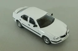 Газ-3111 Волга 2000, белый, 100046, Автоистория 1:43