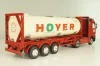 Mercedes-Benz Actros 1846 tractor with semi trailer tankwechsel system "Hoyer", red/white, 564/02, NZG 1:43