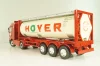 Mercedes-Benz Actros 1846 tractor with semi trailer tankwechsel system "Hoyer", red/white, 564/02, NZG 1:43