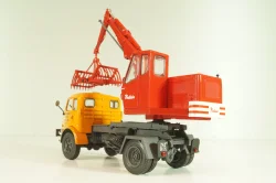 Saviem 4x4 truck with a hydraulic excavator "Poclain" 1957, orange/red, Les Plus Mythiques Saviem #3, Deagostini 1:43