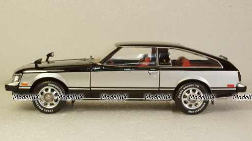 Toyota Celica XX black/silver 1978, WB124060, WhiteBox 1:24