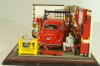 Volkswagen Kafer (Beetle) with 2 figures and diorama Service station, red, Mini-Rama 1:43