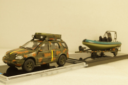 Mercedes ML320 W163 1998 with powerboat Ukraine Territorial Defense Forces (Mykolaiv 2022), TruckTyr 1:43