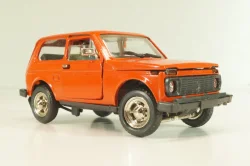 Ваз-2121 Лада Нива, март 1995г., красная, Тантал/Радон 1:43