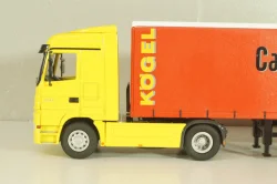 Mercedes-Benz Actros 1846 tractor with semi trailer "Cargo-Maxx" yellow/red, 555, NZG 1:50