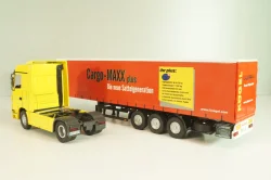 Mercedes-Benz Actros 1846 tractor with semi trailer "Cargo-Maxx" yellow/red, 555, NZG 1:50