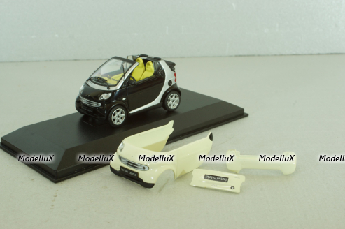 Smart fortwo cabrio black with body panel Fresh-Up (white), 0012497V001C51Q00, Minichamps 1:43