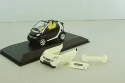 Smart fortwo cabrio black with body panel Fresh-Up (white), 0012497V001C51Q00, Minichamps 1:43