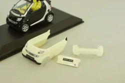 Smart fortwo cabrio black with body panel Fresh-Up (white), 0012497V001C51Q00, Minichamps 1:43