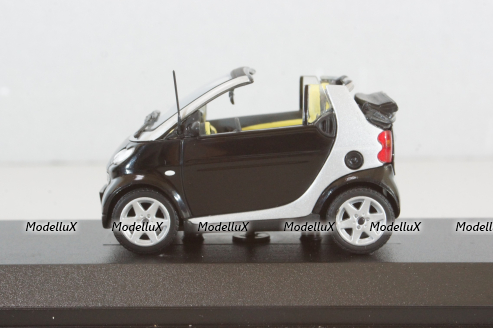 Smart fortwo cabrio black with body panel Fresh-Up (white), 0012497V001C51Q00, Minichamps 1:43